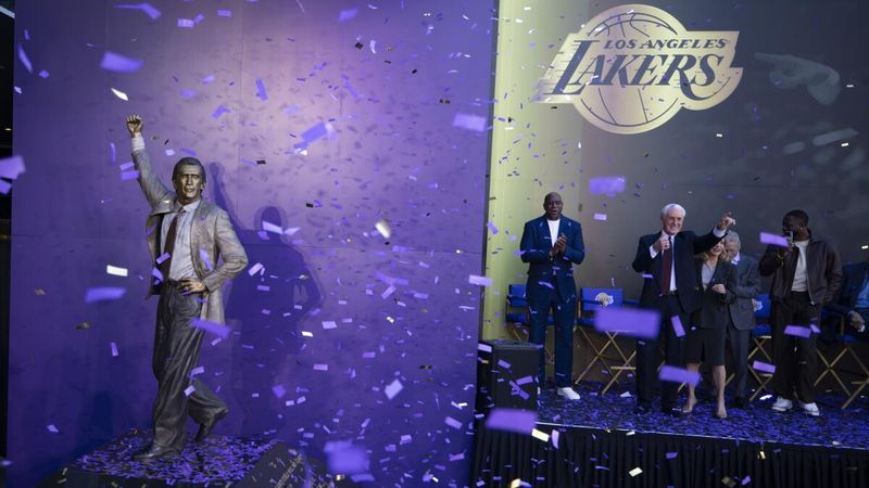 A bronze statue of Pat Riley outside Crypto.com Arena depicting him in a coaching stance during the Lakers’ Showtime era.